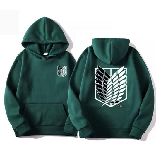 Two views of a dark green hoodie on a white background, showing the front and back. The front features a small white Attack on Titan Scout Regiment crest on the left chest, and the back features a large version of the same crest.